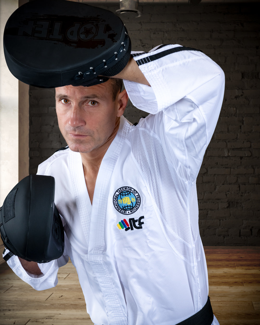TOP TEN taekwondo drakt (dobok) – ITF-godkjent for NTN og ITF Taekwondo | Combat Store Norge