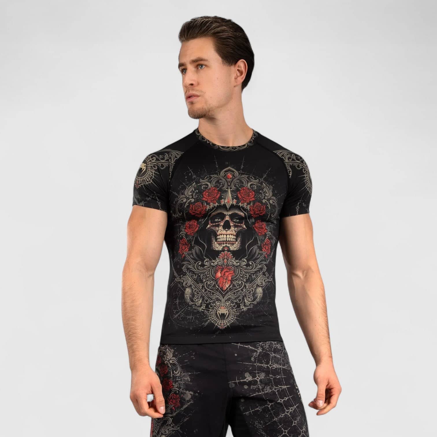 Svart og gull kortermet VENUM Santa Muerte 5.0 rashguard